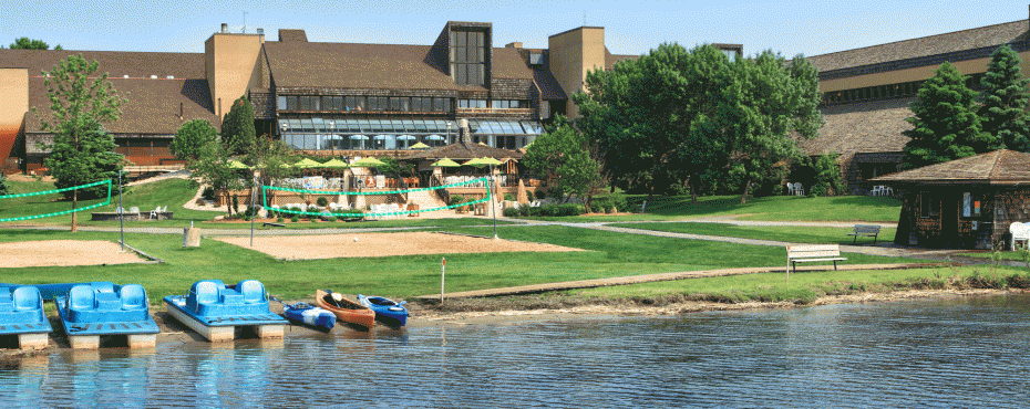 view of resort and beached kayaks from middle of water