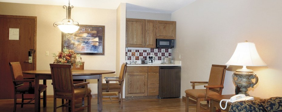 dining area with seating, food prep space, and sink